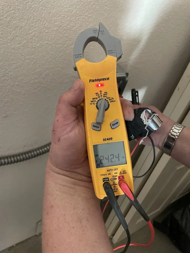 Voltage testing with clamp meter during Electrical Installation Services in Porterville